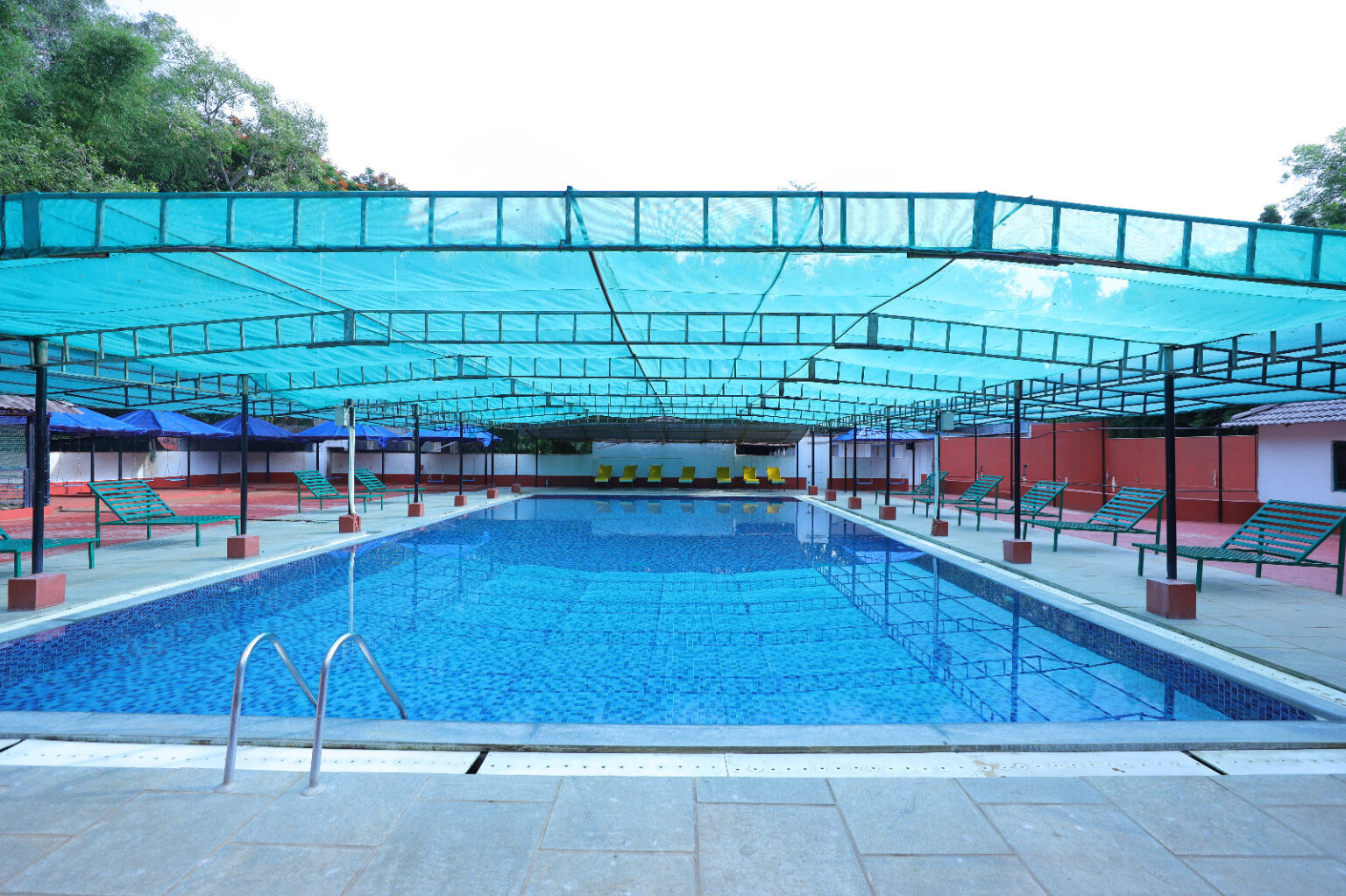 swimming pool at nature resort near Bangalore Jaladhama